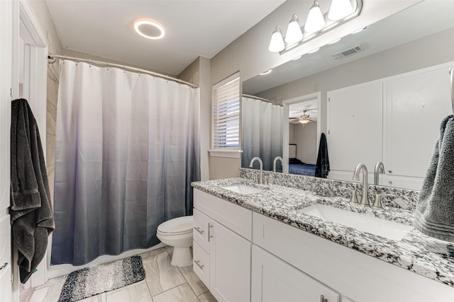 1401 Crescent Dr, Sherman, TX 75092 - bathroom with marble finish floors, ceiling fan, double vanity, toilet, and a shower with curtain