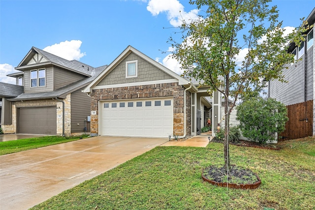 view of front of house featuring a garage and a front yard