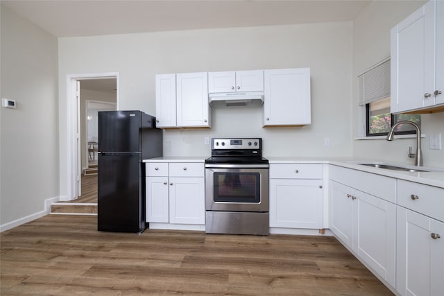 kitchen with black fridge, sink, dark hardwood / wood-style floors, electric range, and white cabinetry