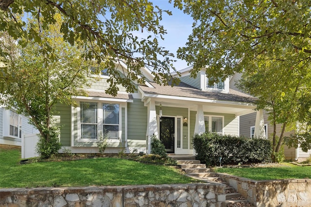 view of front of home with a front yard