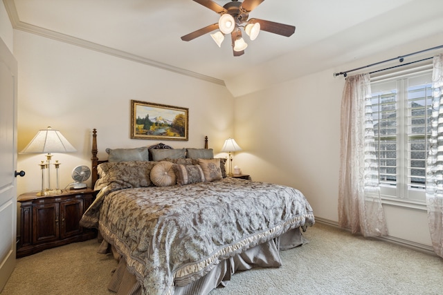 bedroom with ceiling fan, ornamental molding, and light colored carpet