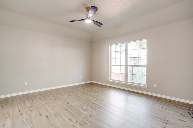 unfurnished room featuring ceiling fan and light hardwood / wood-style floors