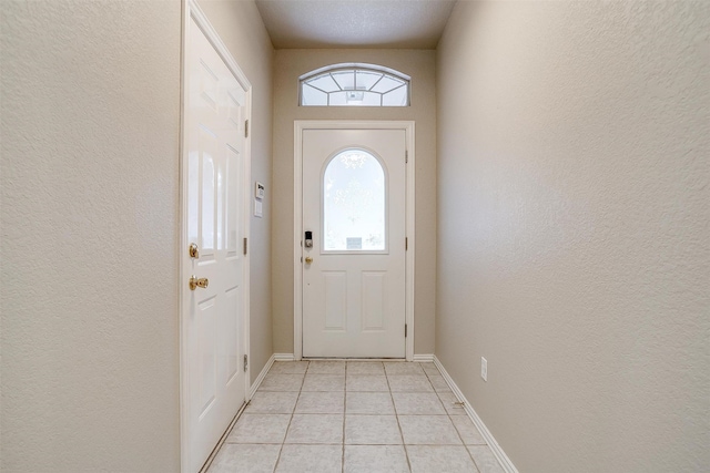 entryway featuring light tile patterned floors