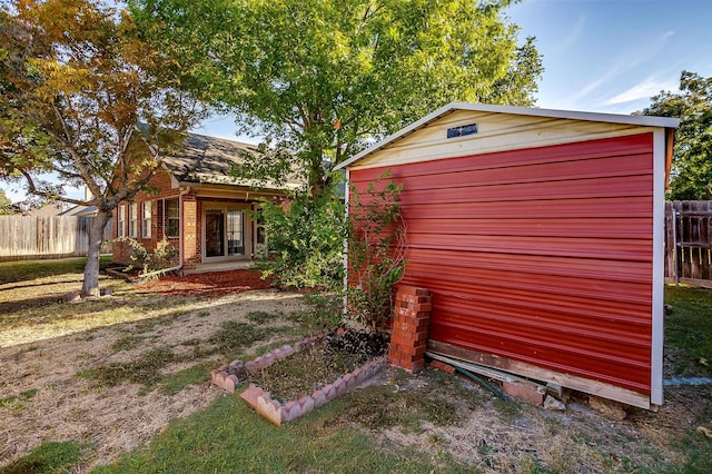 view of outdoor structure with a yard