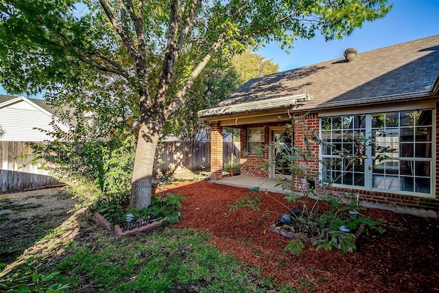 back of house featuring a patio