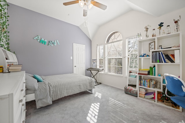 bedroom featuring lofted ceiling, light carpet, and ceiling fan