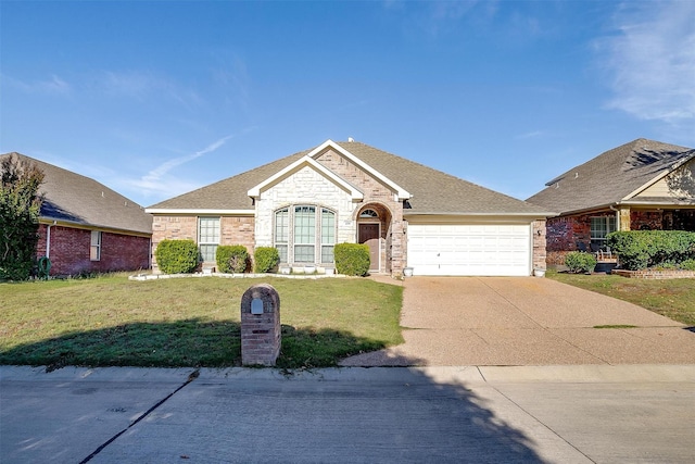 ranch-style home with a garage and a front yard