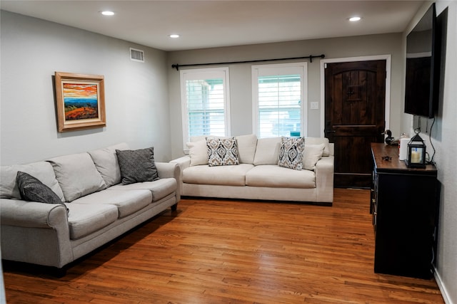 living room featuring light wood-type flooring