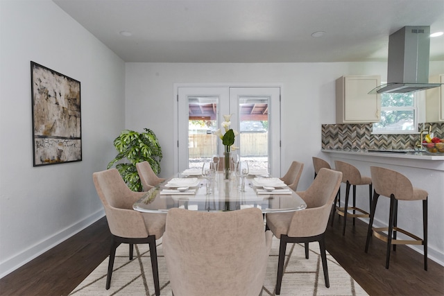 dining space featuring hardwood / wood-style flooring