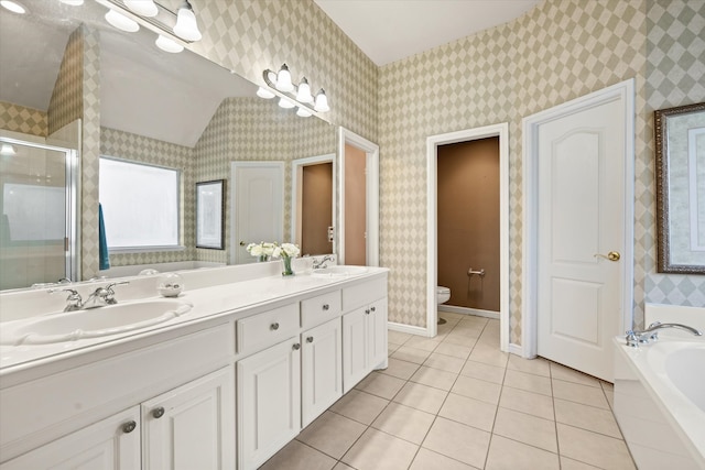 full bathroom with vanity, independent shower and bath, tile patterned floors, and toilet