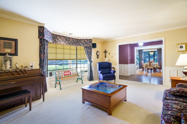 carpeted living room with ornamental molding