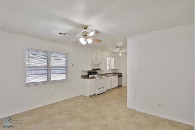 kitchen featuring white cabinets, sink, white appliances, and ceiling fan