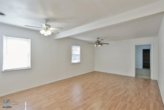 unfurnished room featuring light wood-type flooring, beamed ceiling, and ceiling fan