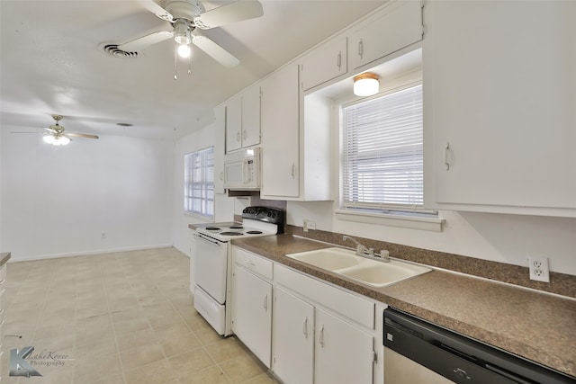 kitchen with white cabinetry, sink, ceiling fan, light tile patterned floors, and white appliances