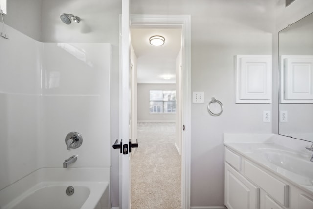 bathroom featuring vanity and bathing tub / shower combination