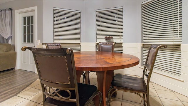 dining area with light tile patterned flooring