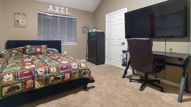 bedroom with light colored carpet and lofted ceiling