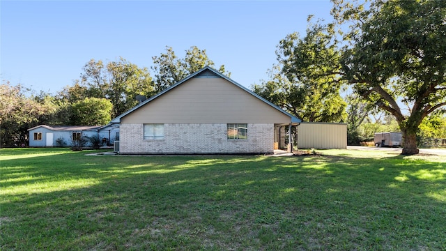 view of property exterior with a yard