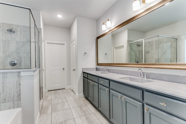 bathroom with vanity, tile patterned floors, and separate shower and tub