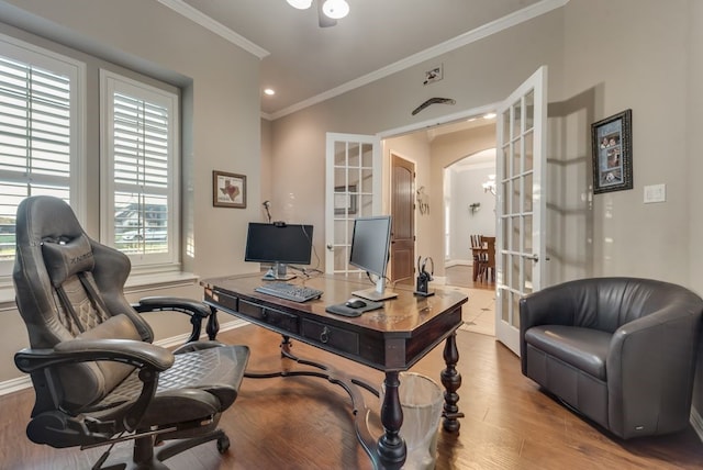 office area with hardwood / wood-style floors, ornamental molding, and french doors