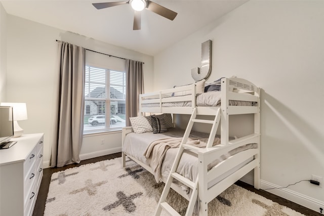 bedroom featuring dark wood-type flooring and ceiling fan