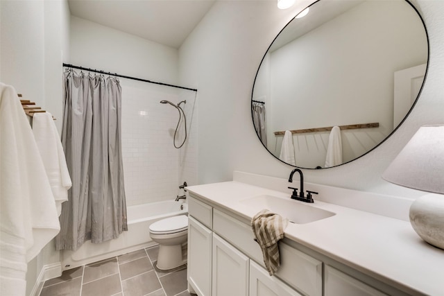 full bathroom with vanity, tile patterned floors, toilet, and shower / bath combo