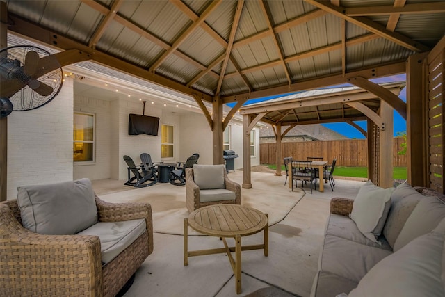 view of patio featuring outdoor lounge area, a gazebo, outdoor dining area, and a grill