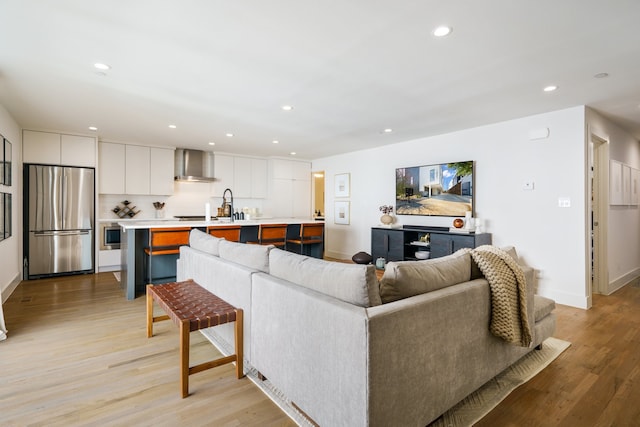 living room featuring light wood-type flooring