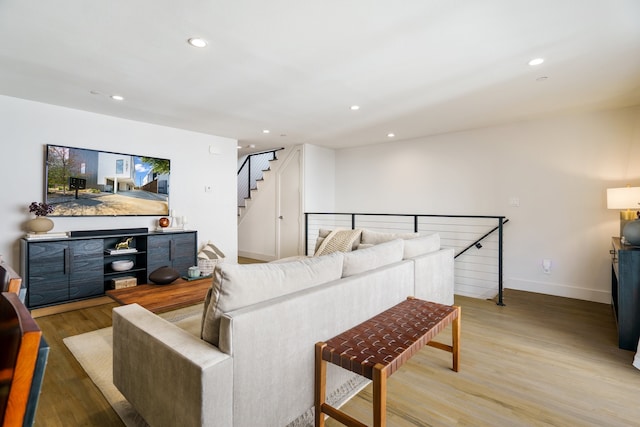 living room with light hardwood / wood-style floors