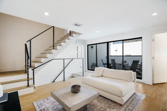 living room with hardwood / wood-style floors