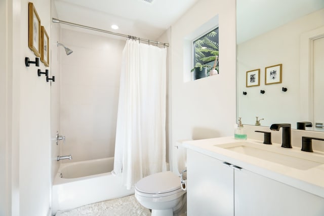 full bathroom featuring vanity, toilet, and shower / bathtub combination with curtain