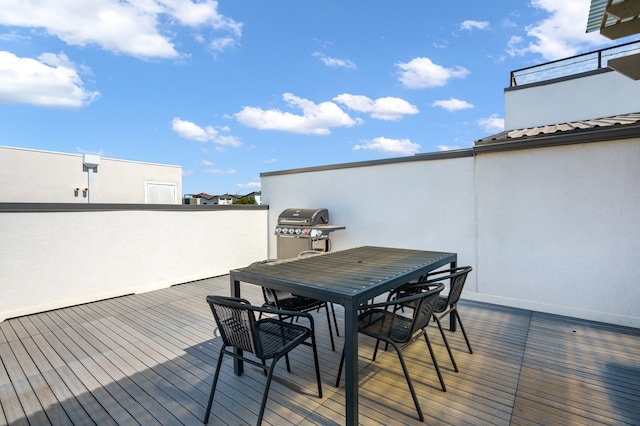 deck featuring grilling area