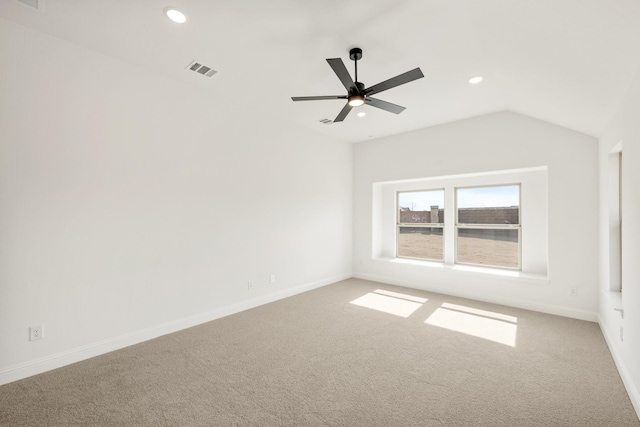 carpeted spare room with visible vents, baseboards, a ceiling fan, lofted ceiling, and recessed lighting