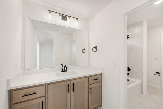 full bath with toilet, shower / bath combination, vanity, and baseboards