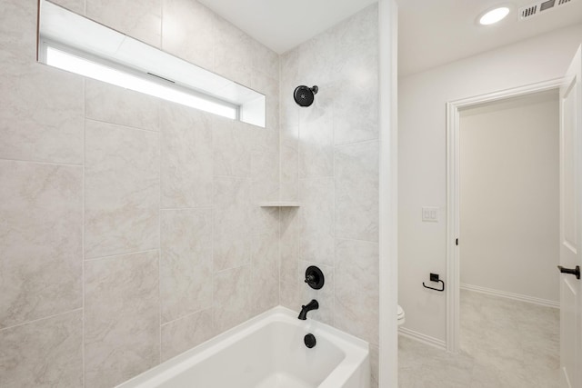 bathroom with shower / washtub combination, baseboards, visible vents, and toilet