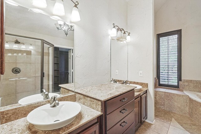 unfurnished room featuring vaulted ceiling, ornamental molding, ceiling fan, light hardwood / wood-style floors, and a textured ceiling