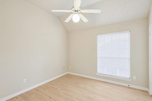 bathroom featuring vanity, a textured ceiling, and toilet