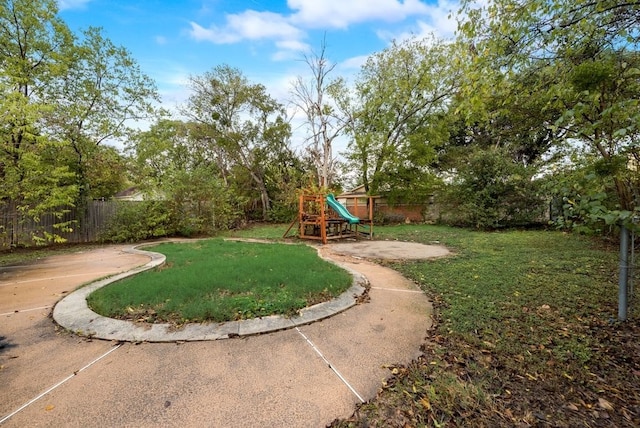 view of yard with a playground