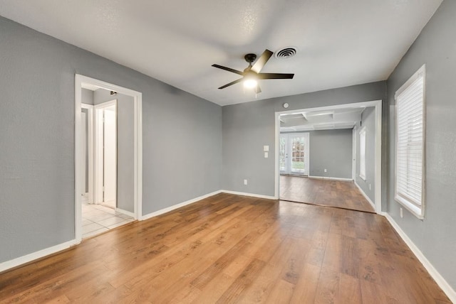 interior space featuring ceiling fan and light hardwood / wood-style flooring