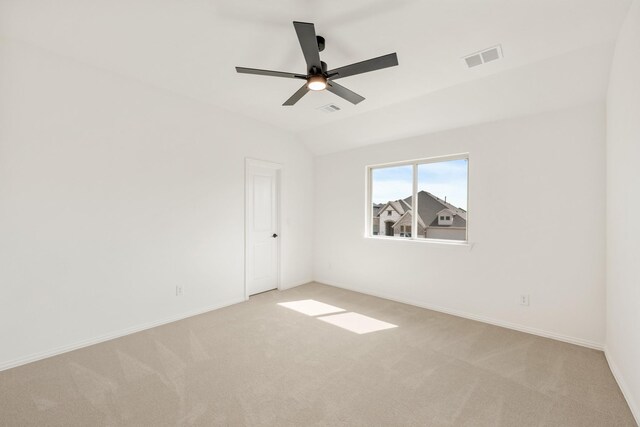 carpeted bedroom featuring ceiling fan and vaulted ceiling