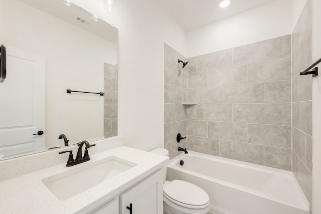 full bathroom with visible vents, shower / bathing tub combination, vanity, and toilet