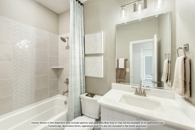 full bathroom featuring shower / bath combo, vanity, and toilet