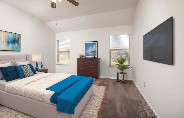 carpeted bedroom featuring vaulted ceiling and ceiling fan