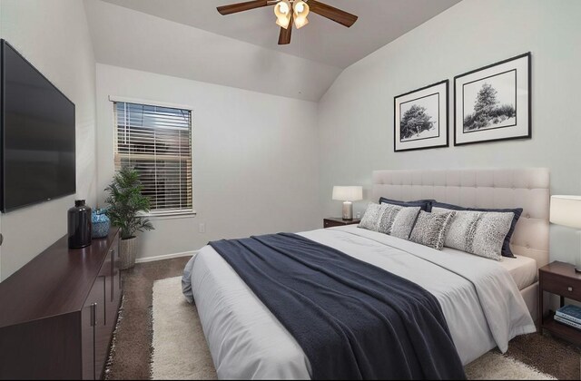 spare room with lofted ceiling, carpet flooring, and ceiling fan