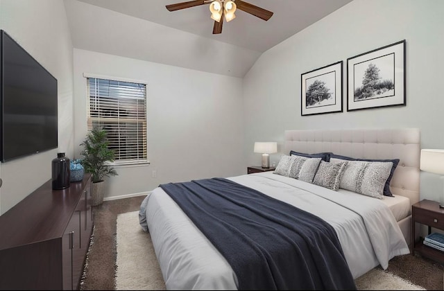 bedroom with vaulted ceiling, carpet flooring, and ceiling fan