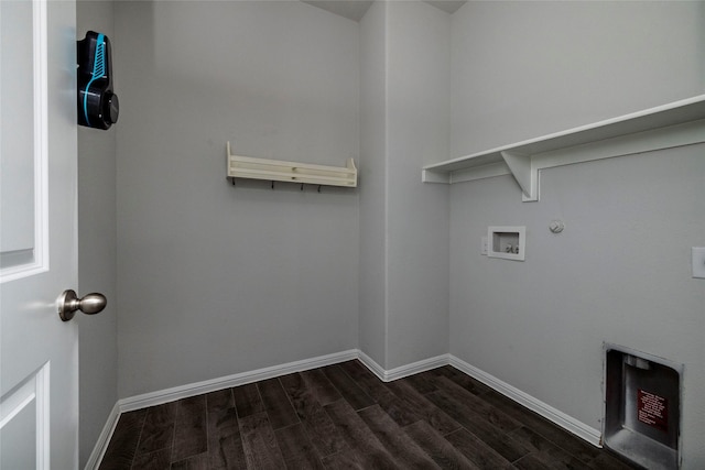 washroom featuring washer hookup, dark wood-type flooring, and gas dryer hookup