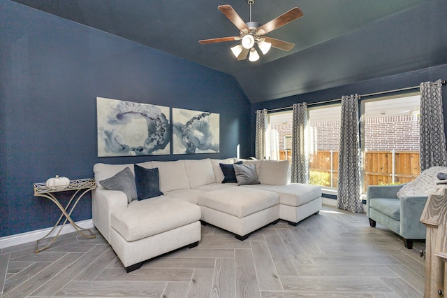 living room featuring parquet floors, ceiling fan, and lofted ceiling