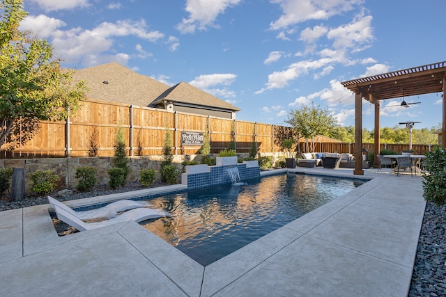 view of swimming pool featuring a patio area, an outdoor living space, and pool water feature