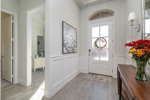 foyer with light hardwood / wood-style floors