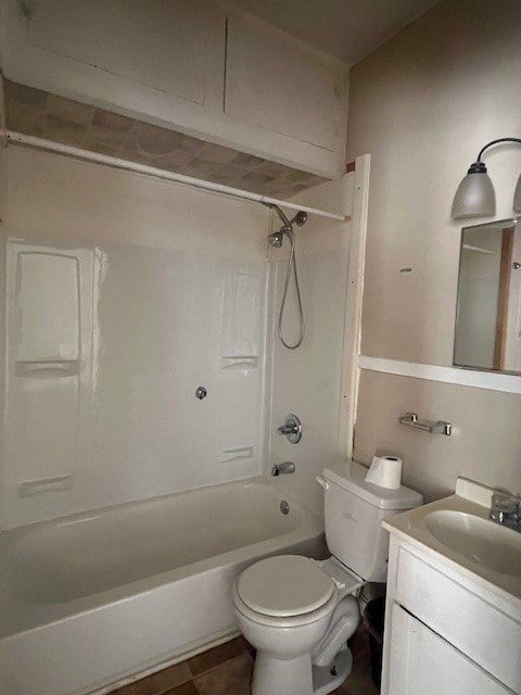 full bathroom featuring vanity, washtub / shower combination, and toilet